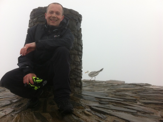 Andrew Caple with 'friend 'at the top of Snowdon